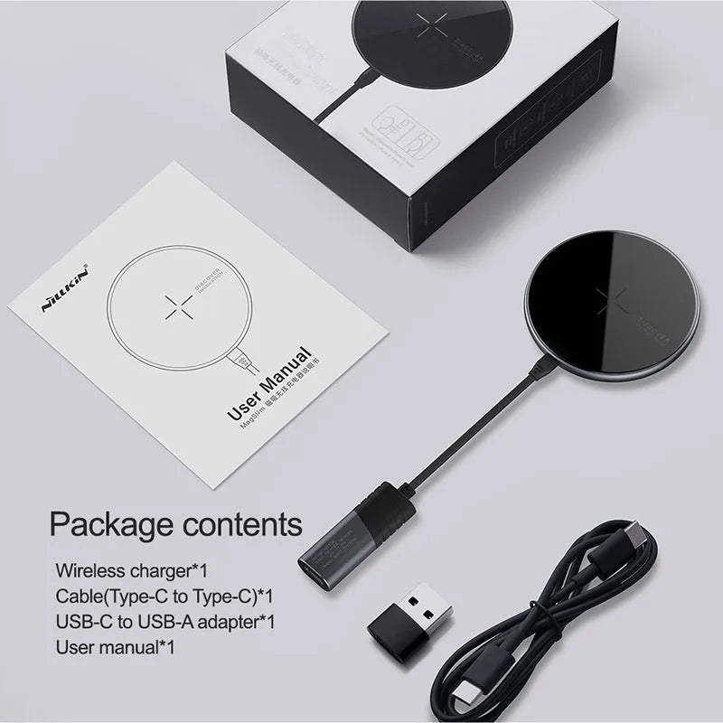 MagSlim magnetic wireless charger NKT06 in Black on a desk with a phone placed on it
