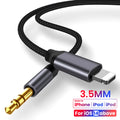 Silver 3.5mm male-to-male nylon braided aux audio cable coiled on a table with length marked as 1m