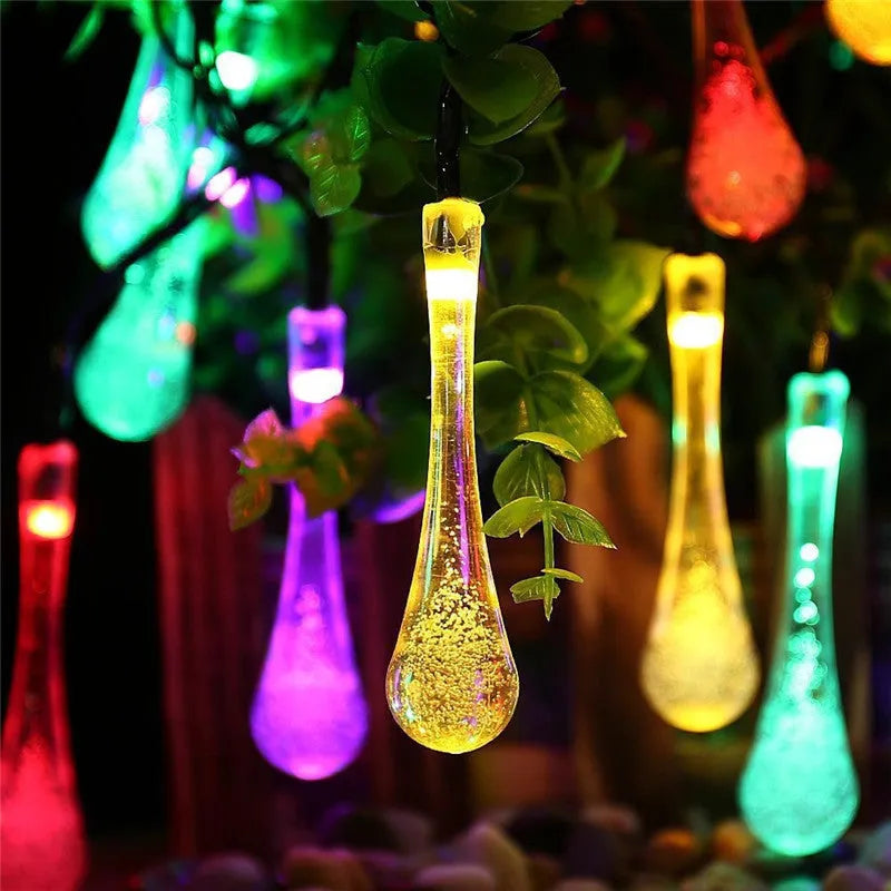Solar-powered LED outdoor string lights with bubble drop pendants on 6.5 metre cable