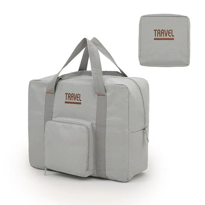 Black cube-shaped travel storage bag made from Oxford cloth with a sealed top.