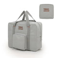 Black cube-shaped travel storage bag made from Oxford cloth with a sealed top.