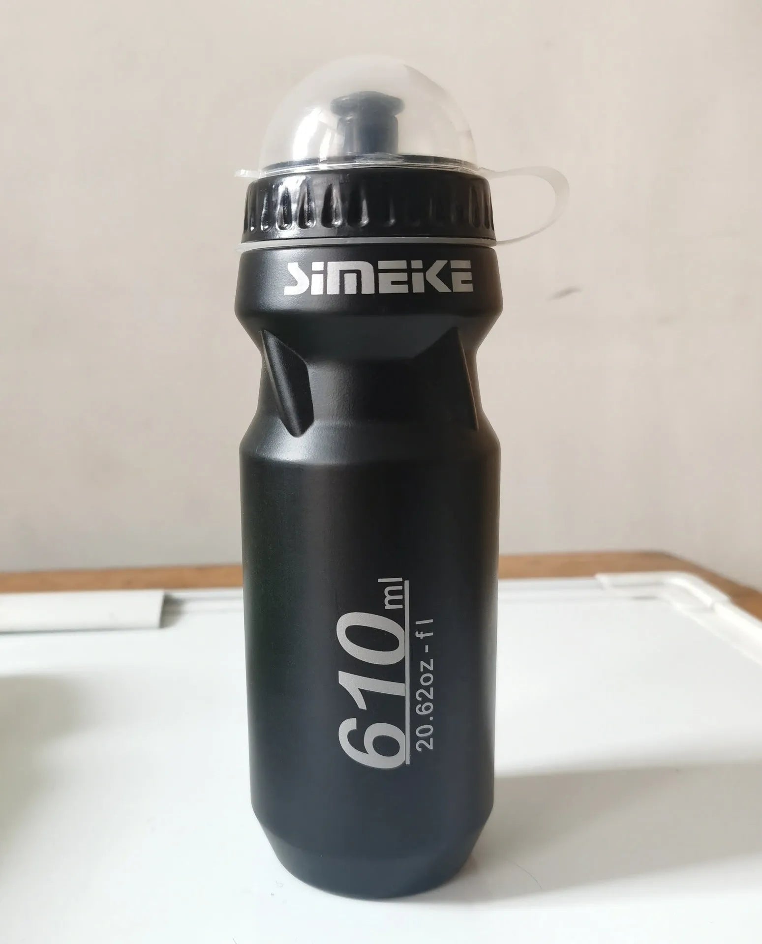 610ml transparent PC bicycle water bottle in black, green, and red colours for outdoor sports
