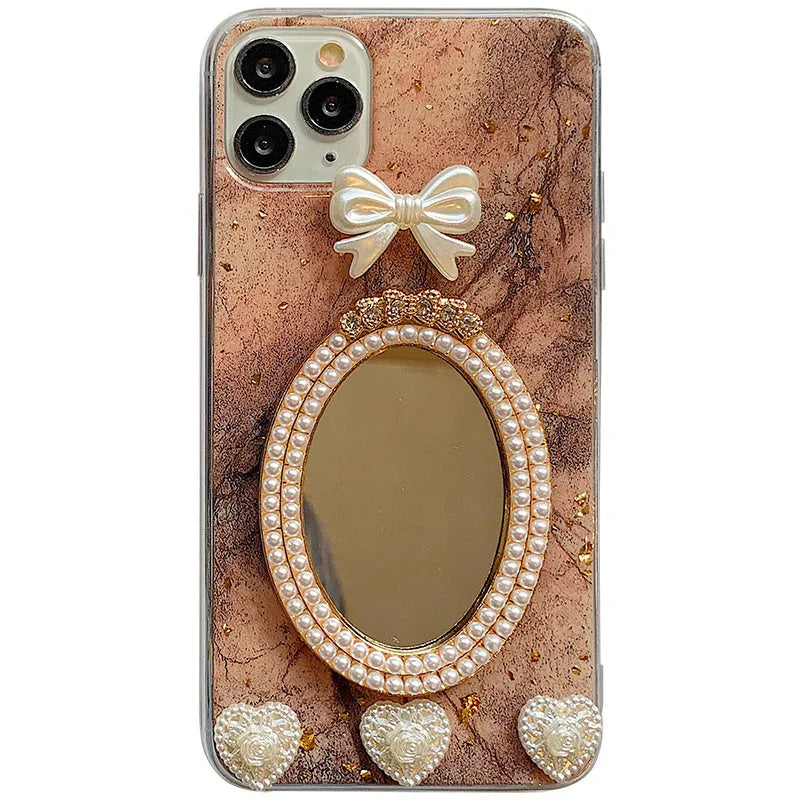 Brown marble bowknot rhinestone mirror phone case for iPhone models showing mirror surface
