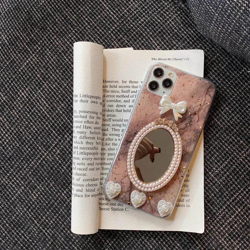 Brown marble bowknot rhinestone mirror phone case for iPhone models showing mirror surface