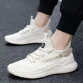 Men's white low-top mesh sports shoes with rubber sole and front tie laces on a plain background