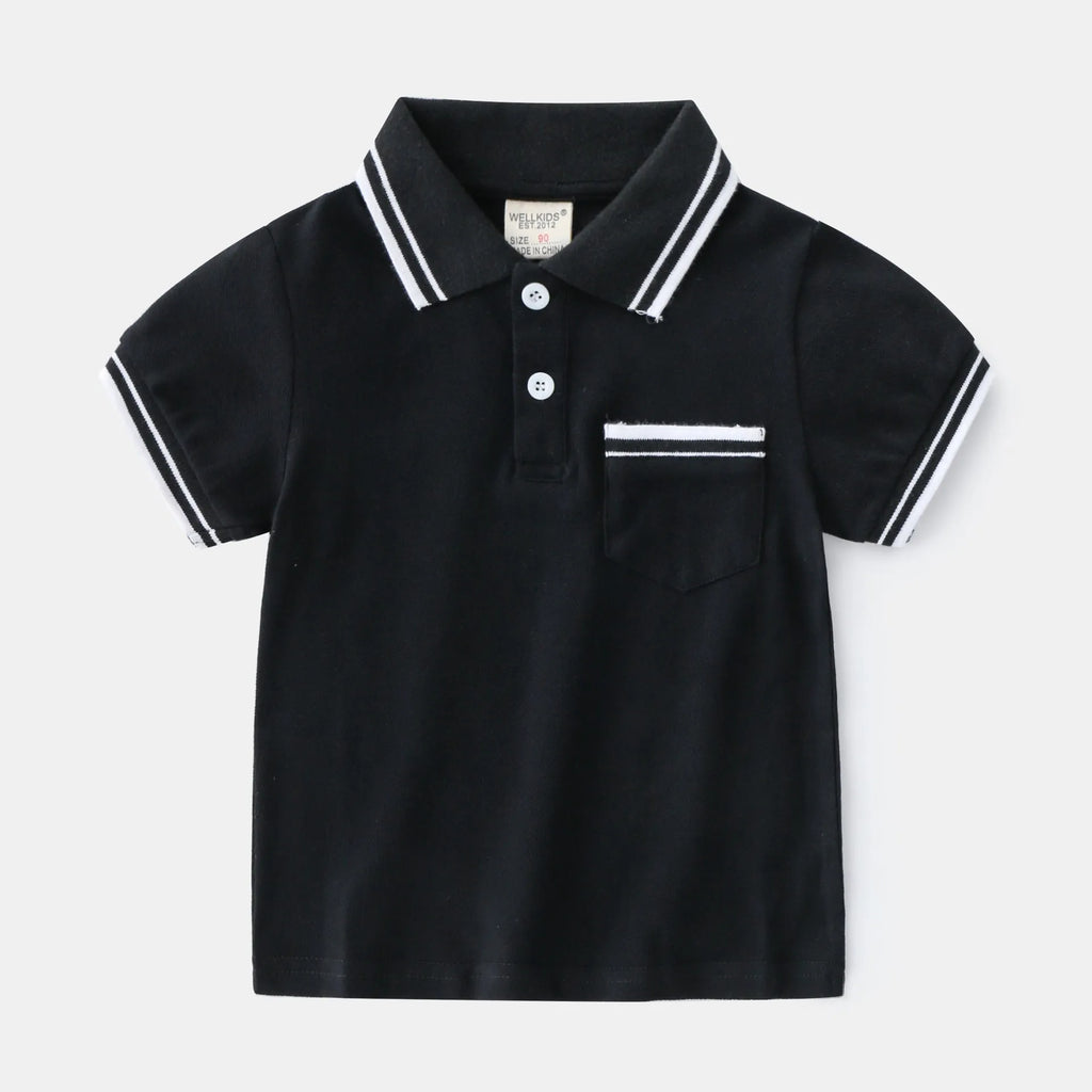 White boys cotton polo shirt with short sleeves and a round neck on a flat lay.