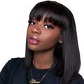Black human hair wig showing 10 inch short to medium length on a mannequin head.