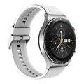 Black smart watch with circular touch screen and silicone strap showing Bluetooth call and music playback interface
