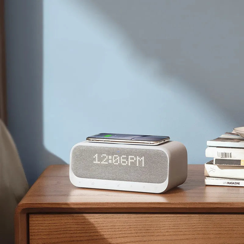 White Bluetooth speaker with wireless charging pad and touch controls showing 82x92x200mm dimensions