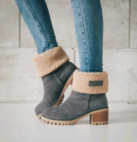 Women's mid-tube suede snow boots with thick construction and flat heel in multiple colour options