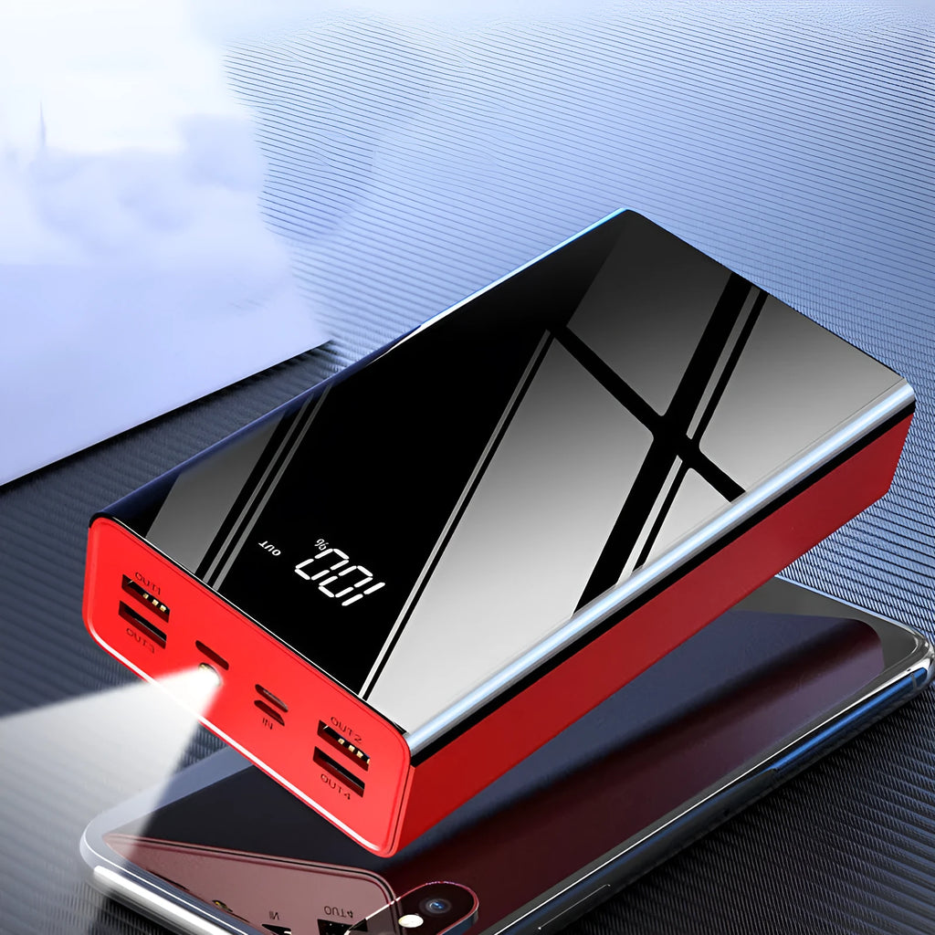 Black and red 40000mAh power bank with LCD screen showing battery percentage