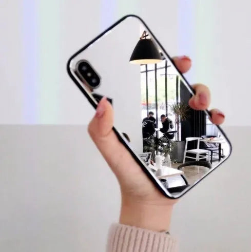 Black iPhone back cover case with a square mirror inset on the back.