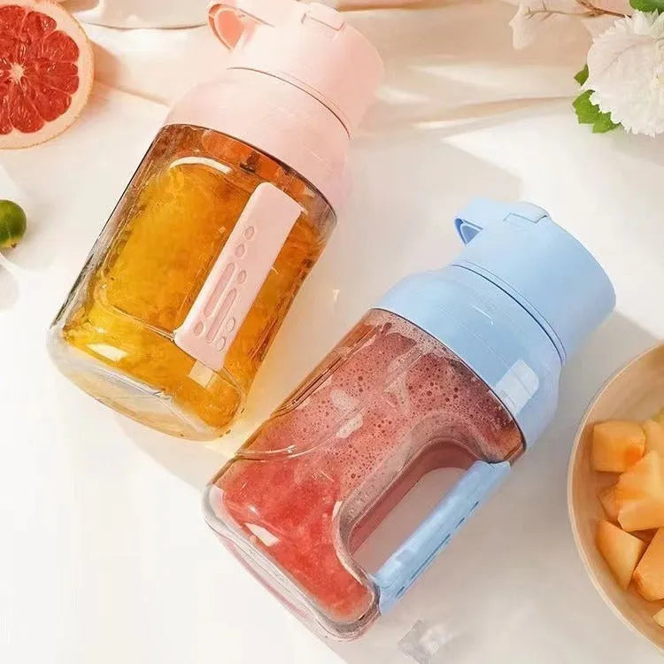 Portable electric juicer 1500ml USB rechargeable in pink with double handles and steel blades