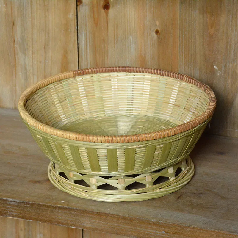 Handmade bamboo storage basket with woven construction in three size options