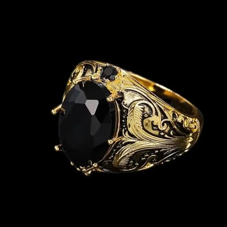 Men's silver alloy wide face ring with geometric imitation ink colour moonstone gem ornament on a flat surface