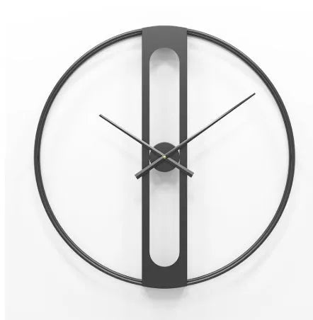 Round metal wall clock with 50 cm diameter in black or gold finish on a plain wall