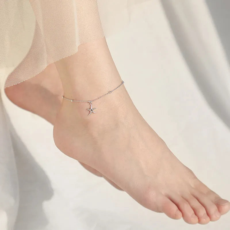 S925 sterling silver anklet with a starfish charm and adjustable beaded chain.