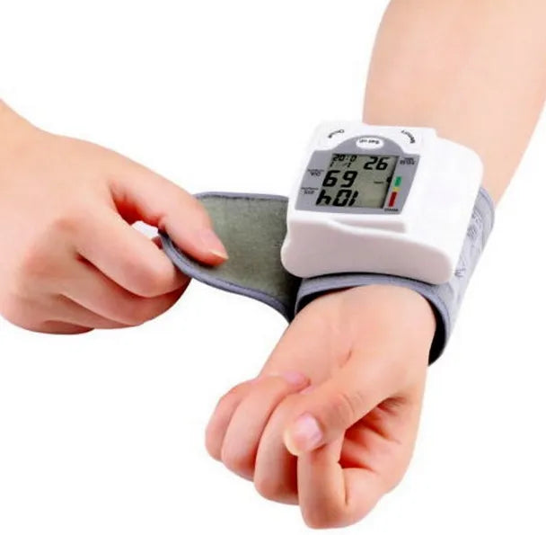 Grey portable wrist blood pressure monitor model C205L9 with display and cuff