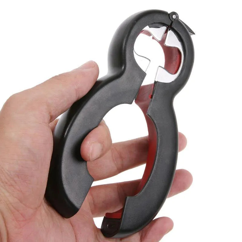 Six-in-one ergonomic bottle and can opener with stainless steel head and soft grey handle on a kitchen countertop