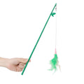Interactive cat toy feather wand with green bells and feathers on a durable wand