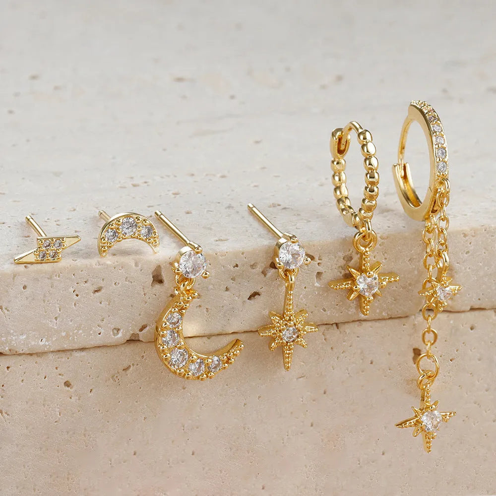 Six gold electroplated zircon stud earrings with chain tassel designs on copper base