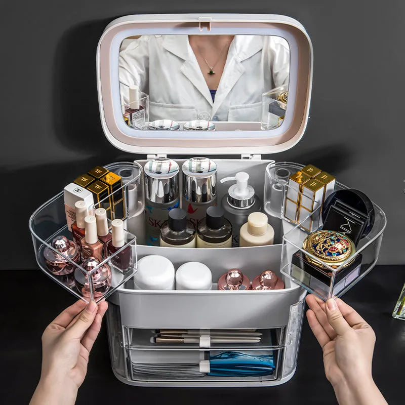 Multifunctional LED makeup box in grey with mirror open showing cosmetics and jewellery storage compartments
