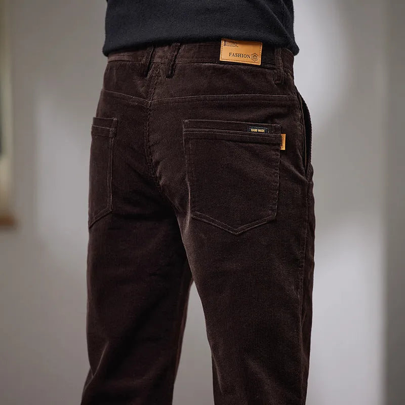 Slim fit straight corduroy trousers in black cotton fabric with mid waist, available in multiple sizes