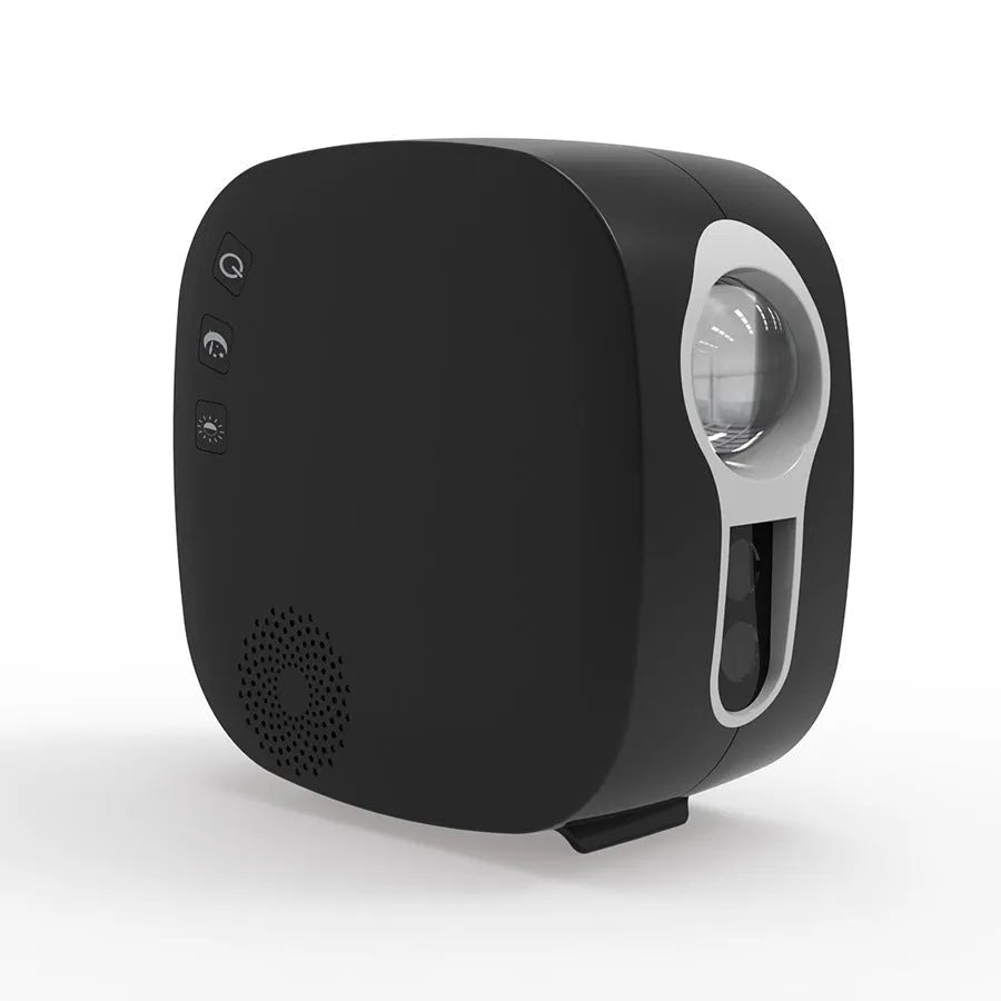 Laser starry sky projection lamp showing colourful nebula and moon pattern, black finish, with USB power cable