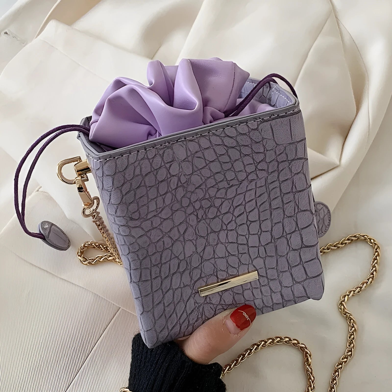 Small one shoulder messenger bag with fashion chain detailing in bucket shape available in six colours