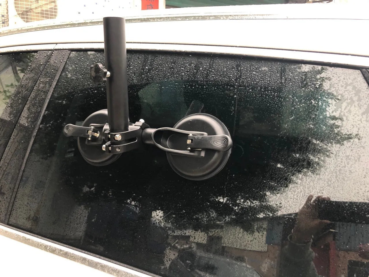 Black off-road car flagpole sucker base with round rubber suction cup and ABS plastic body.
