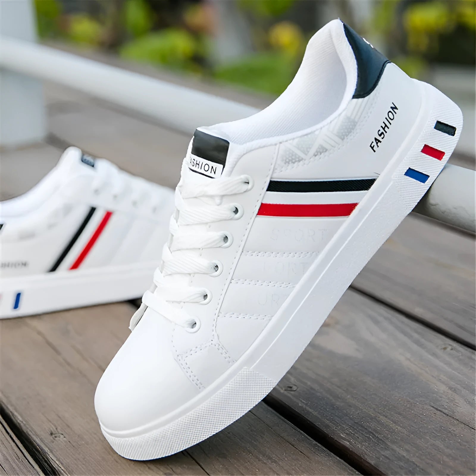 Men's sports shoes in black, grey and white colours, showing lace-up design and available in sizes 39 to 44.