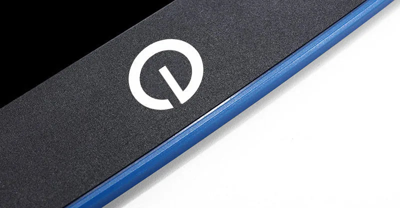 LCD writing tablet with pressure-sensitive blue-green screen and black ABS frame on desk