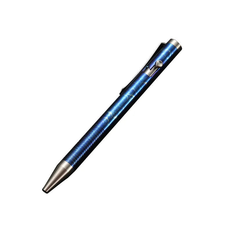 Titanium alloy gun bolt handle ball pen with magic colour phantom finish on a desk.