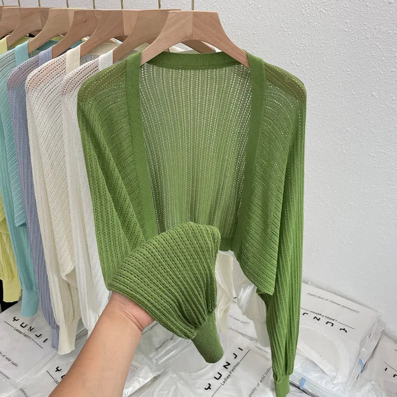 Hollow thin loose lantern sleeve sun protective blouse in apricot, front view for commute
