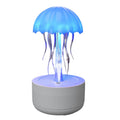 White jellyfish essential oil diffuser with 300ml tank and 7-colour night light on a desk