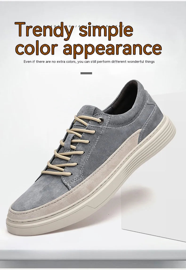 Men's grey casual leather skate shoes with lace-up front and rubber sole