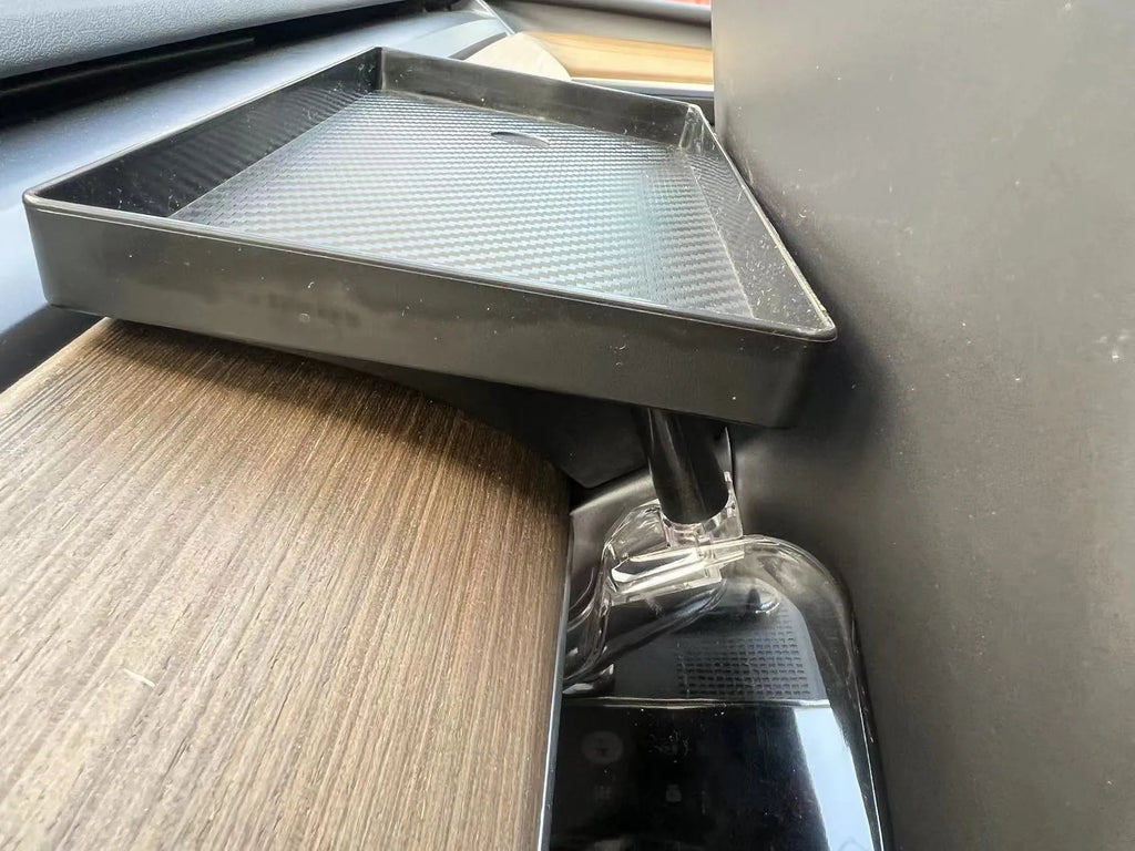 Black ABS storage box placed under Tesla Model 3 centre screen