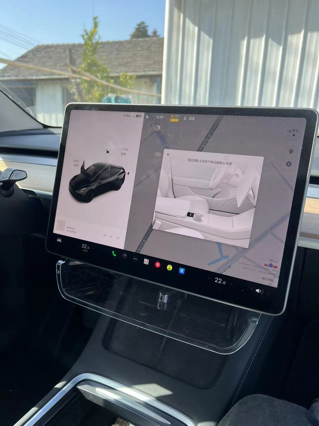 Black ABS storage box placed under Tesla Model 3 centre screen