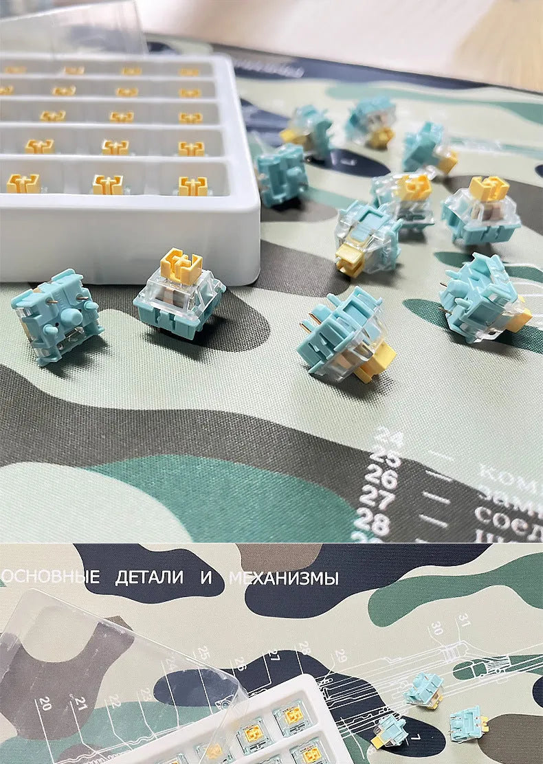 36 clear mechanical keyboard switches with Sea Salt Lemon coloured stems arranged in packaging.