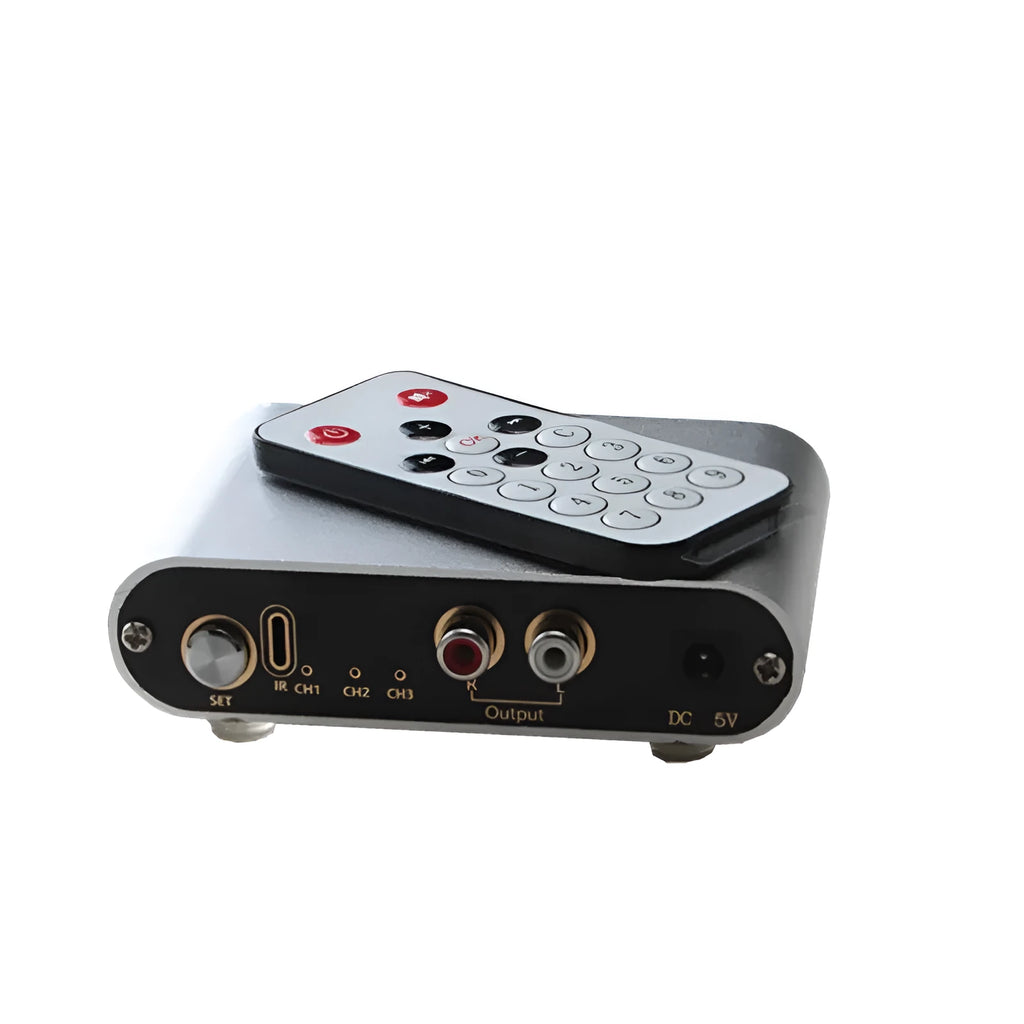 Silver audio source switch with infrared remote control and key switch on front panel, aluminium housing