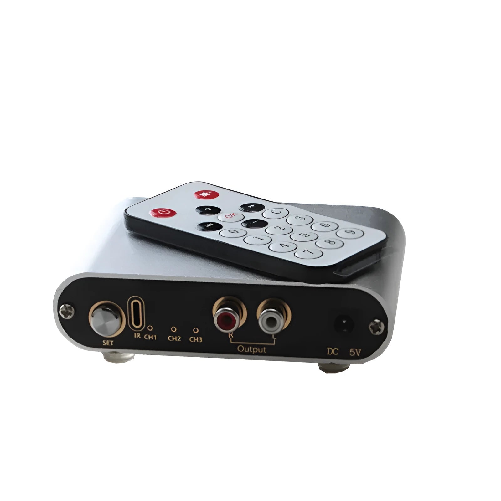 Silver audio source switch with infrared remote control and key switch on front panel, aluminium housing