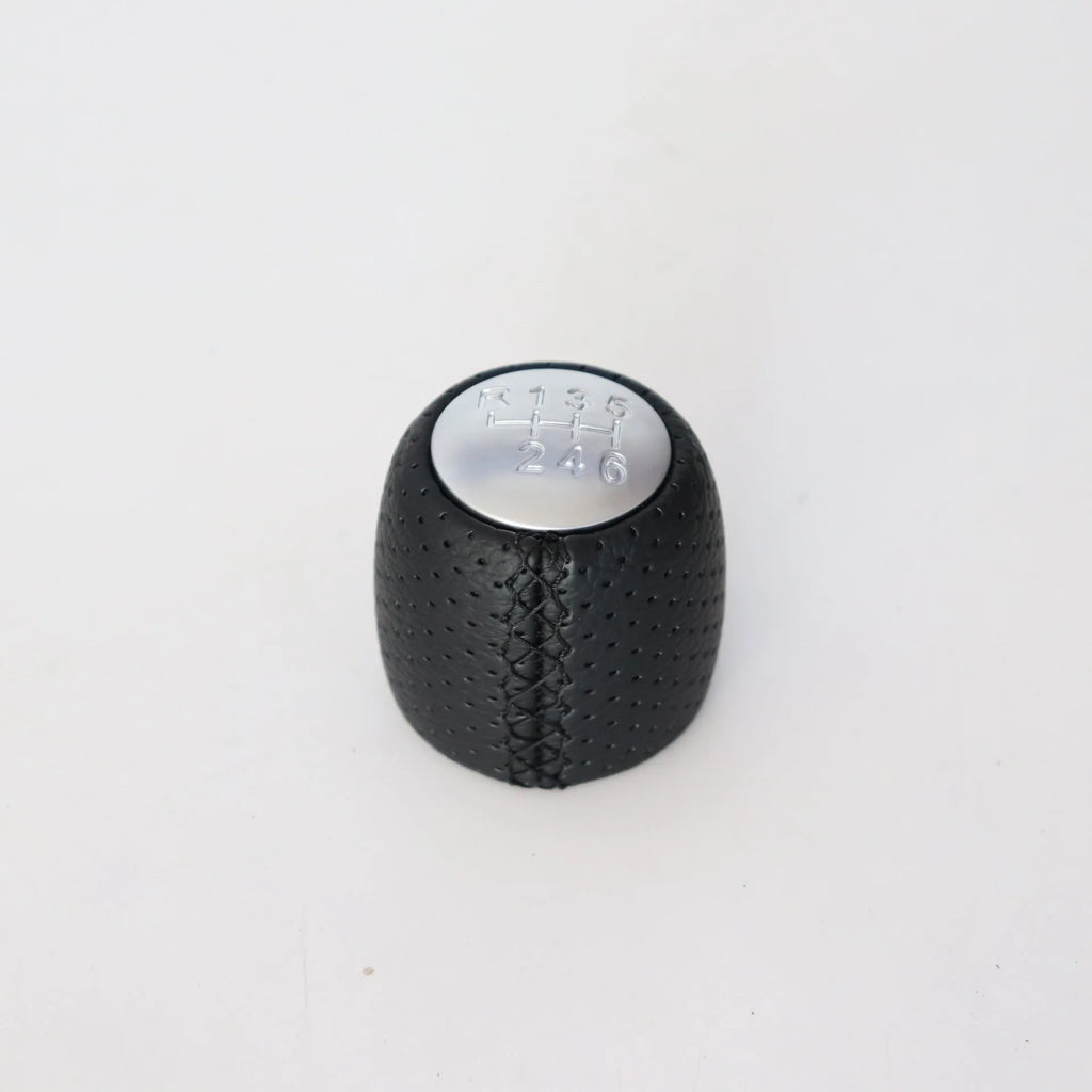 Sewn wrapped perforated PU gear shift knob handball for Alpha vehicle in black line with matte cover
