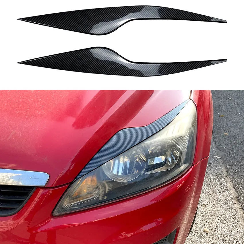 Ford Focus headlight sticker in carbon fiber pattern applied as external eyebrow trim on a car headlight