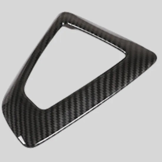 BMW gear base frame in carbon fibre pattern with titanium finish, 13x9cm, left-side fitment