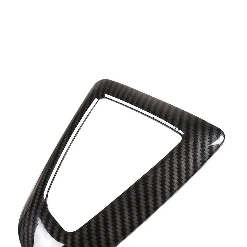 BMW gear base frame in carbon fibre pattern with titanium finish, 13x9cm, left-side fitment