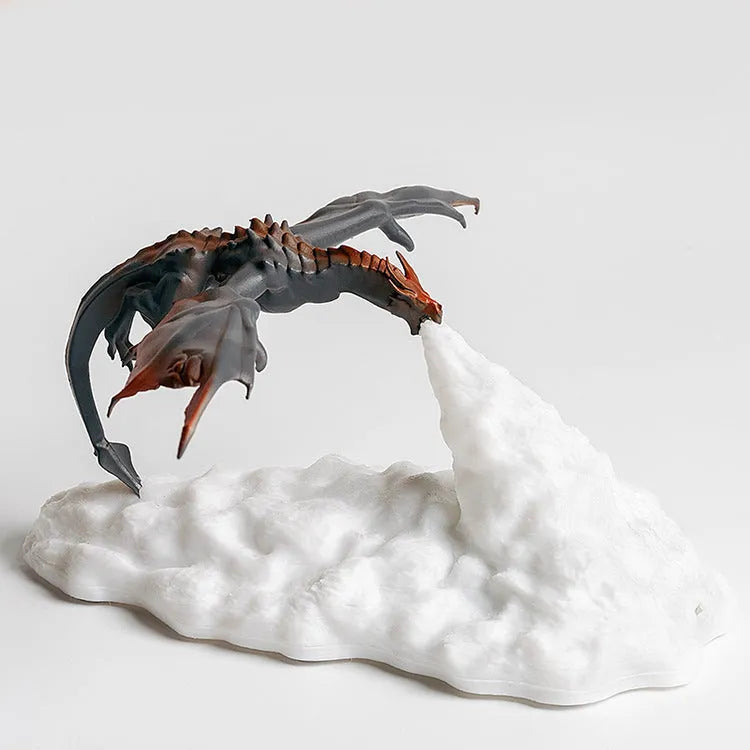 3D printed red dragon night light with fire-breathing LED glow on a dark surface