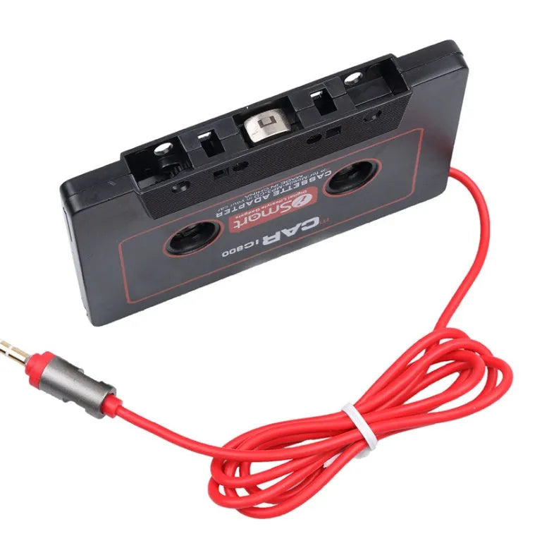 Black car cassette tape adapter with a 3.5mm audio jack plug for connecting MP3 players and phones.