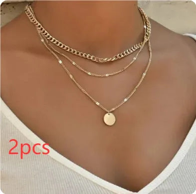 Women's multilayer disc pendant necklace in gold alloy electroplated finish on clavicle-length chain