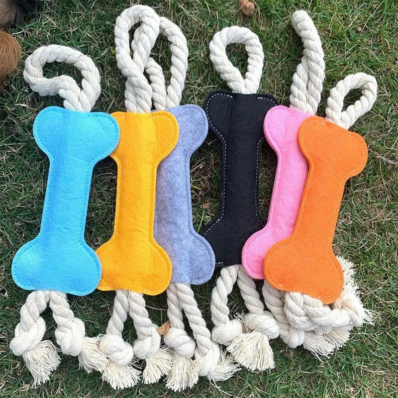 Bone-shaped dog toy with rope knot and felt construction in four colour options
