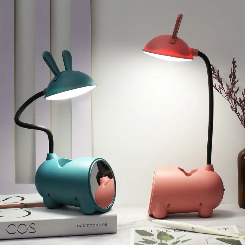 Green cartoon desktop USB table lamp with built-in pen holder container.